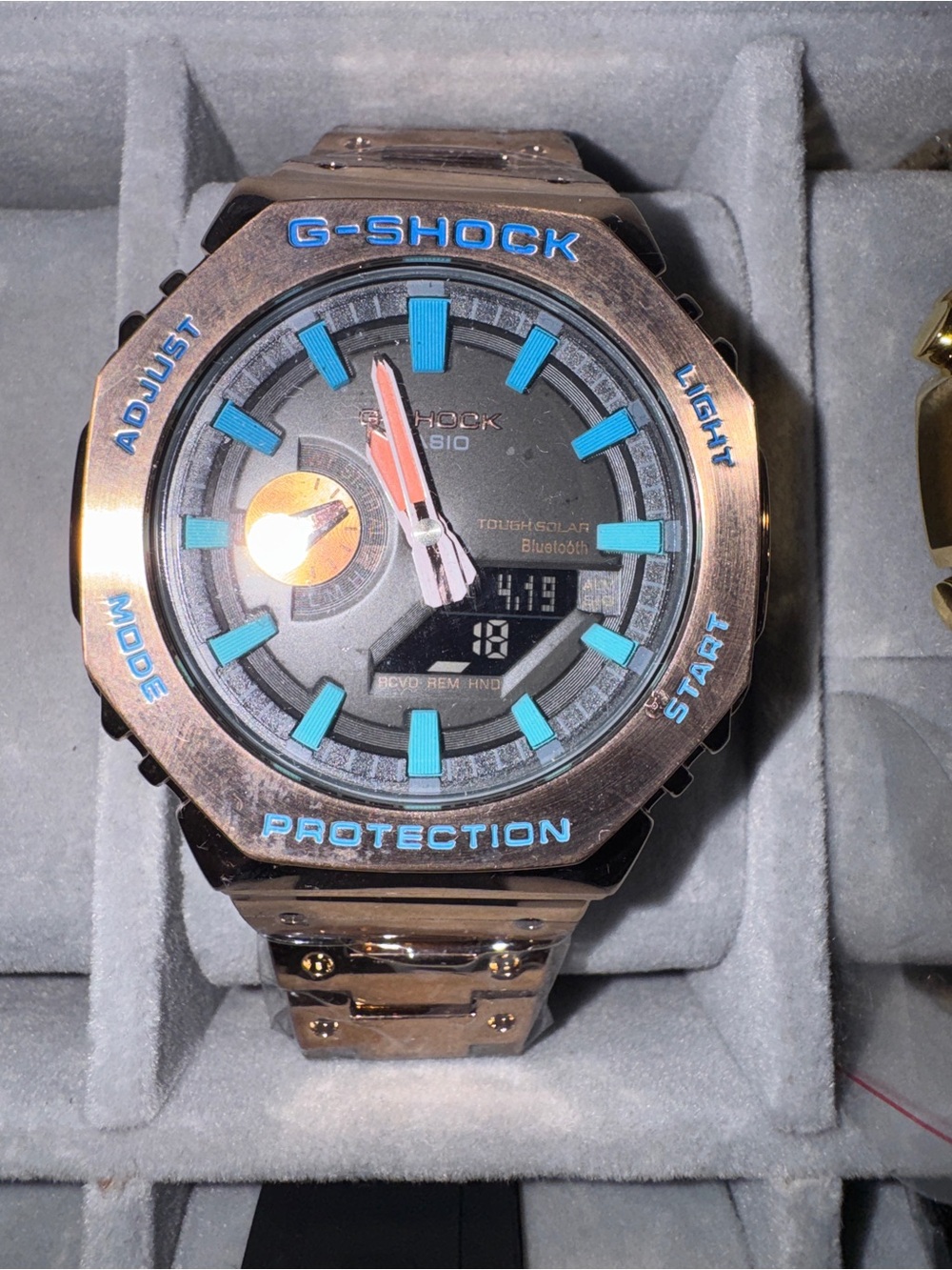 G-Shock Rose Gold Watch with Bright Turquoise Markers